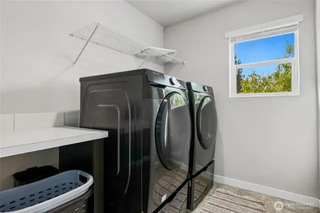 Upper level laundry with window for natural light