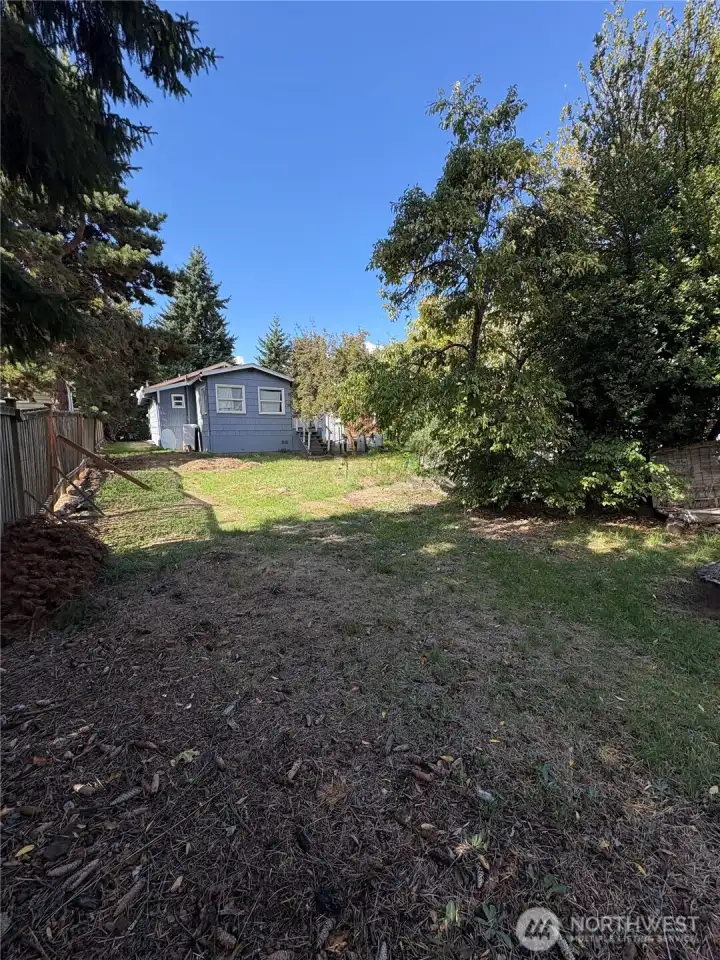 Long lot with paved road access on each end