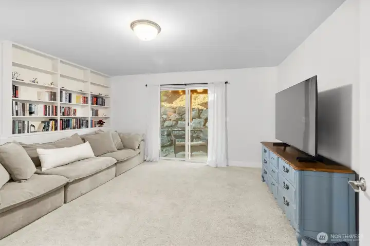 Large bedroom 2 or flex space.  Can be family room, with sliding door to covered deck and direct access to back yard area