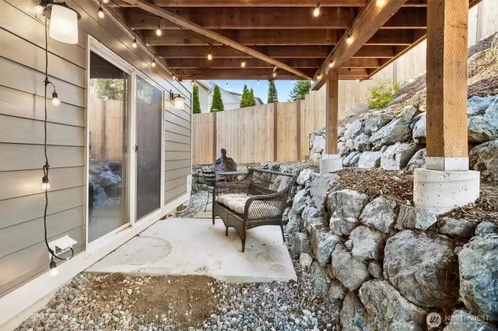 Covered deck area off of bedroom 2 / flex space.  Leads to rest of back yard and lower and upper deck