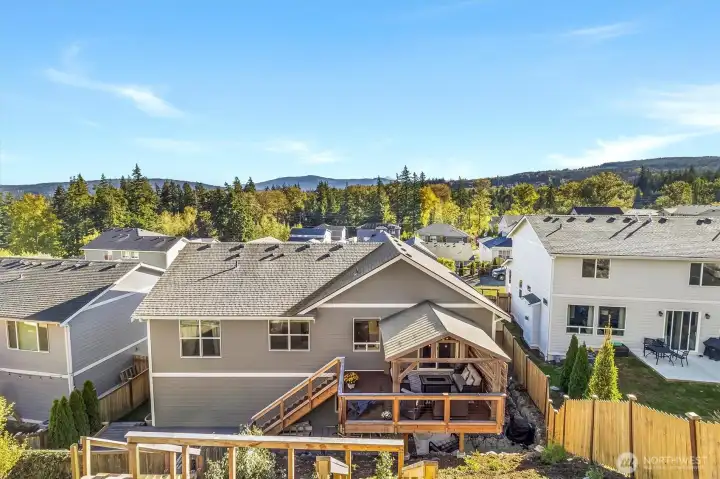 View from stairs towards deck and back of house