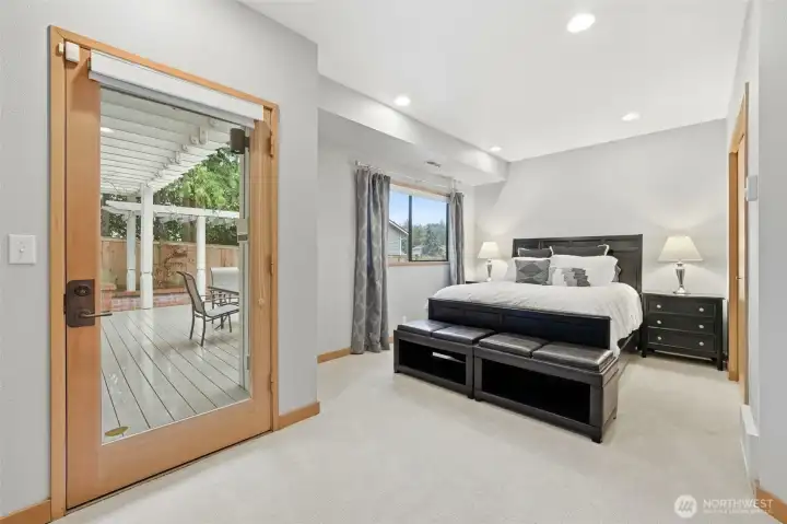 Lower level bedroom with access to exterior.