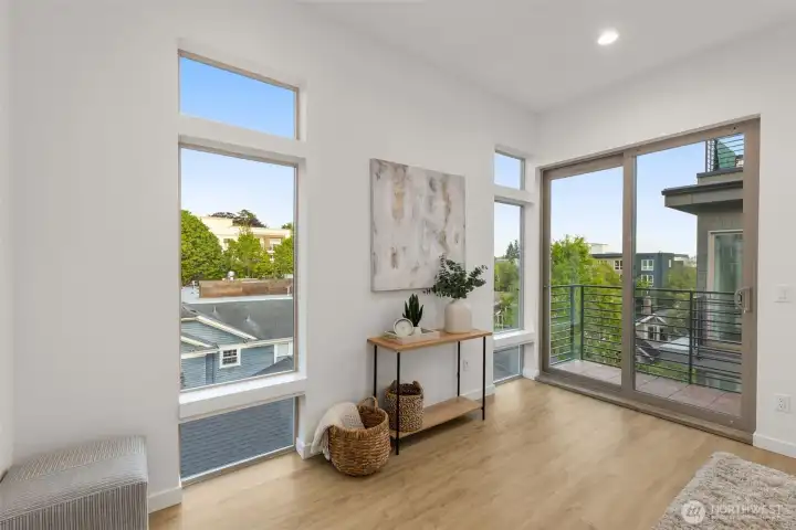 This nook invites relaxation or creative inspiration, plus easy access to your private balcony.