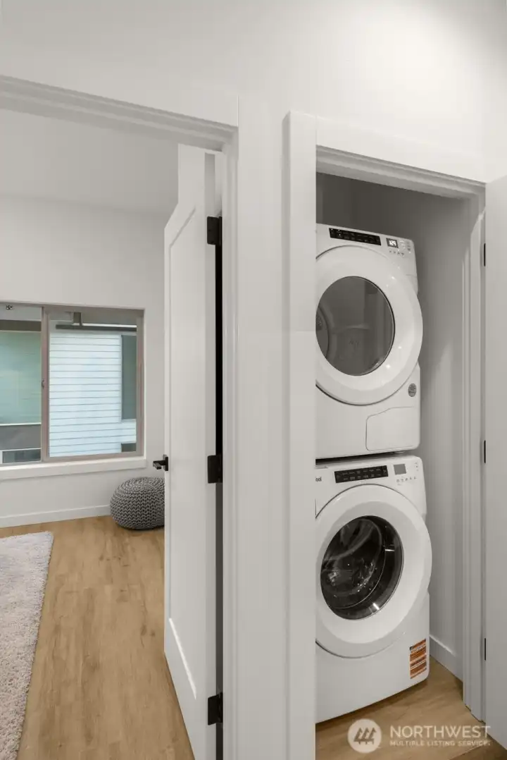Conveniently located near bedrooms, the full-size washer/dryer makes laundry day effortless. Conveniently located near bedrooms, the full-size washer/dryer makes laundry day effortless.