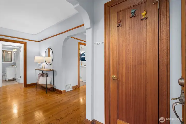 Enter in from the front door and you are welcomed by warm oak trim and doors