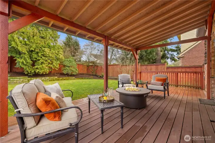 New covered deck with connected gas fire pit.  Great for morning coffee or evening bookreading.