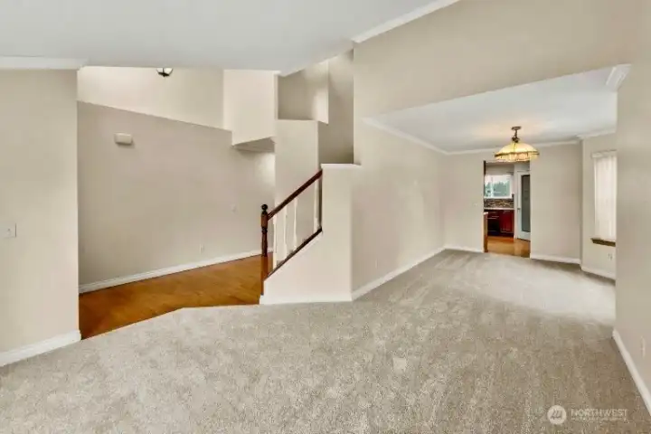 The living room flows seamlessly into the formal dining room for easy entertaining.
