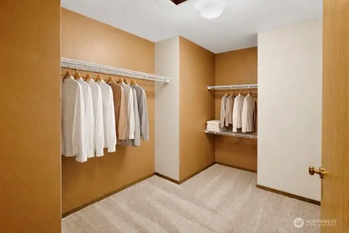 Virtually staged. Primary walk-in closet.