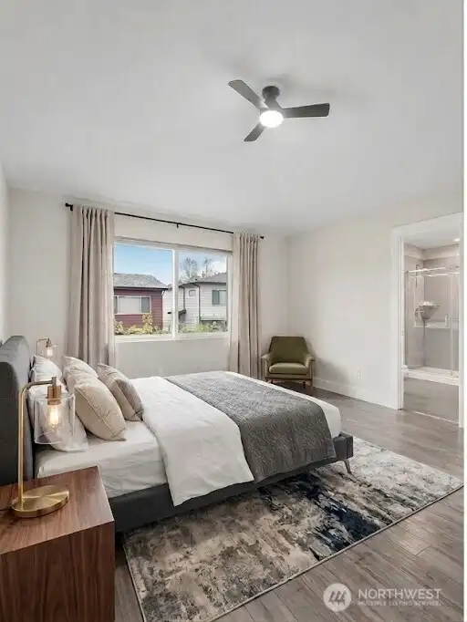 Another view of the primary bedroom.