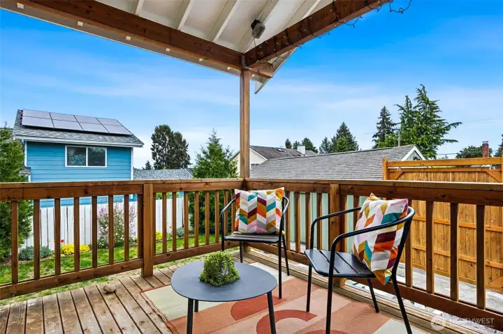 A newer covered deck off the kitchen