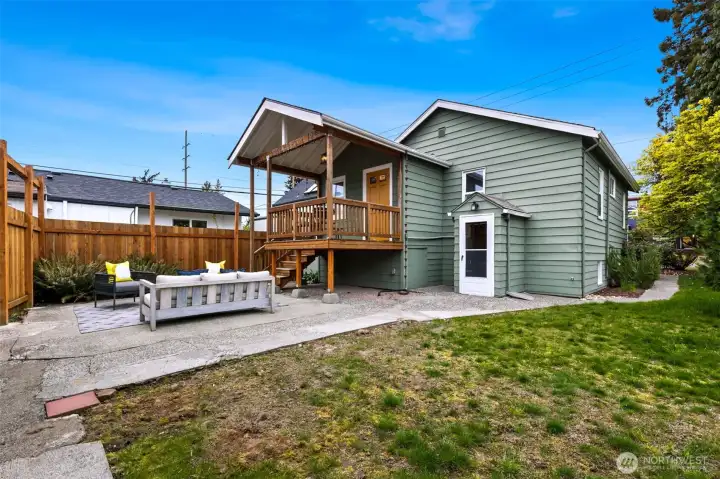 Fenced yard with patio and covered deck