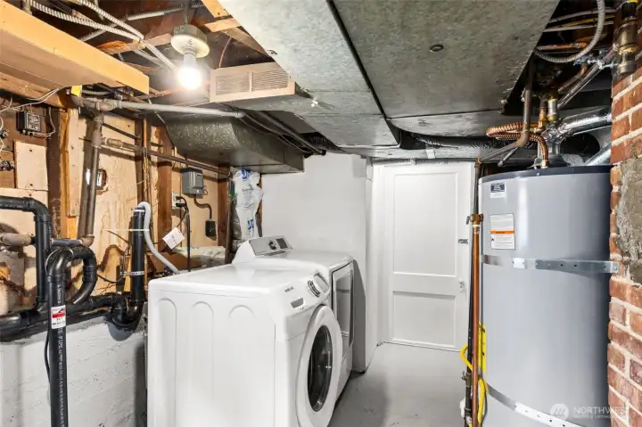 Utility room with washer and dryer