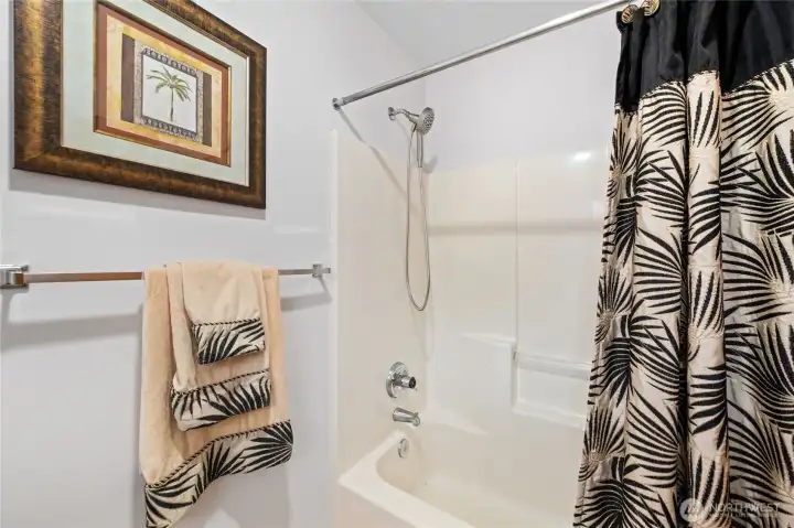 Main Floor: Primary ensuite -Tub/Shower