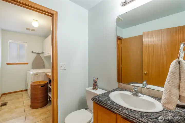 Main Floor: Half Bath and separte utiltily room.