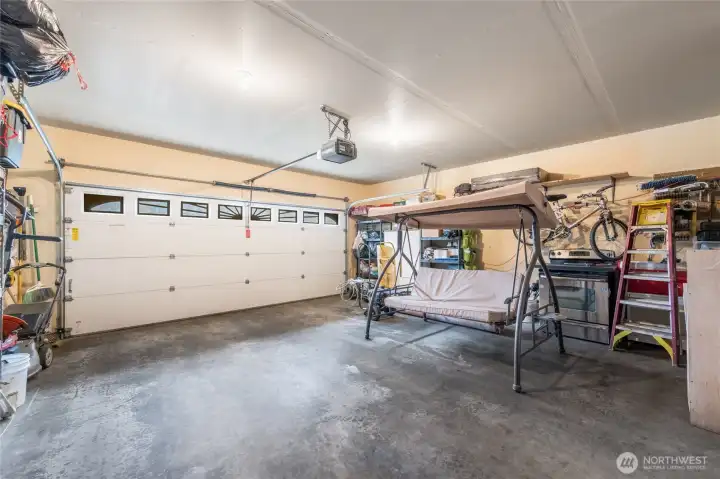 Large garage with power lift door.