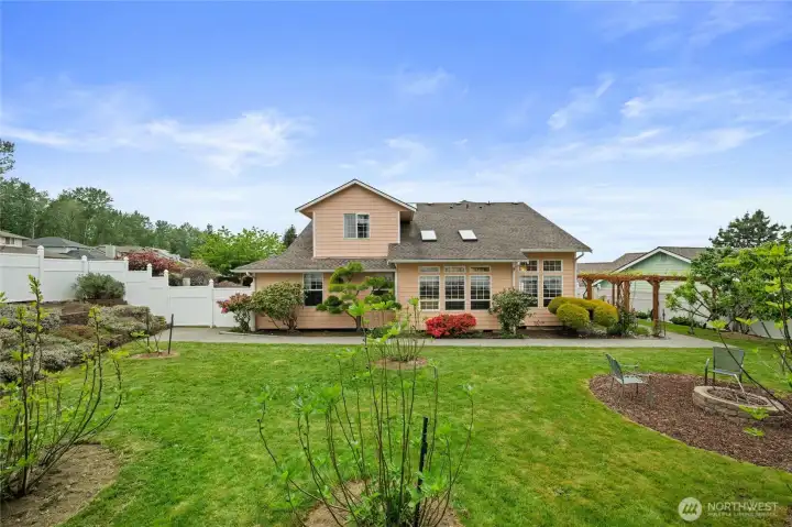 Low maintenance mature landscaping.