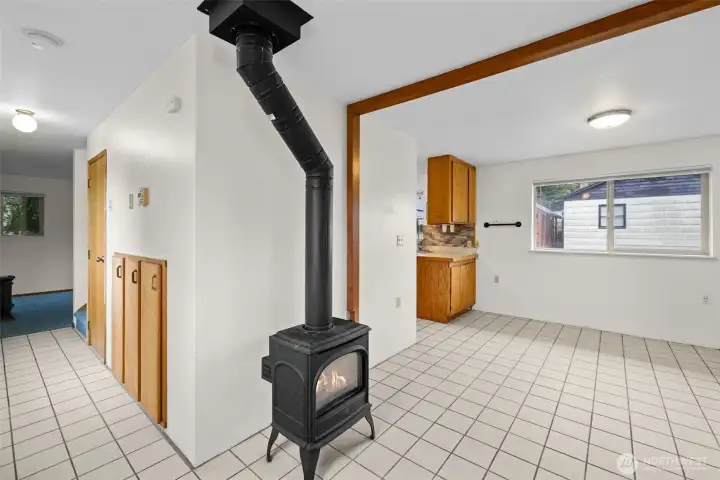 Picture a rainy morning, a hot cup of coffee, and a fire glowing in the stove.    This space was made for slowing down and enjoying the peaceful pace of coastal living
