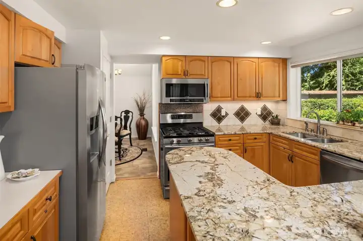 Dining Area, Kitchen, Family Room & Living Room all flow seamlessly