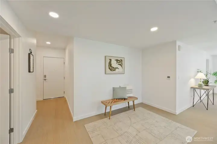 Presenting this new 2 bedroom 1 bath. This is the front entrance. This flex space can be used  as a formal dining room or work space or whatever meets your needs