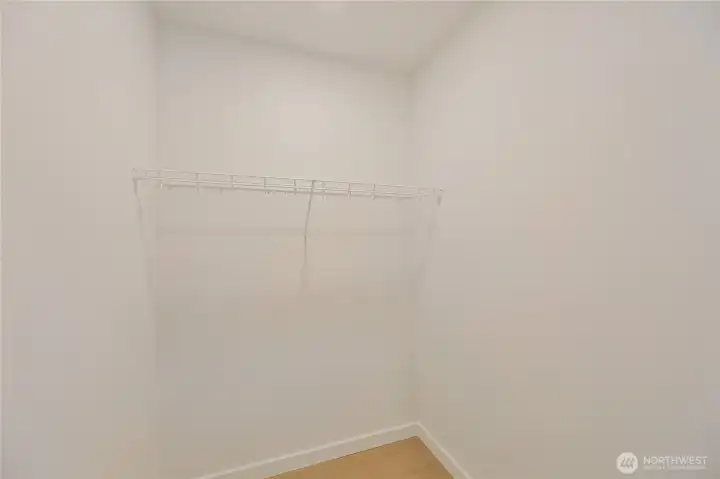 This entry walk in  closet provides great storage