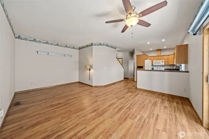Open layout living, dining, and kitchen Open layout living, dining, and kitchen
