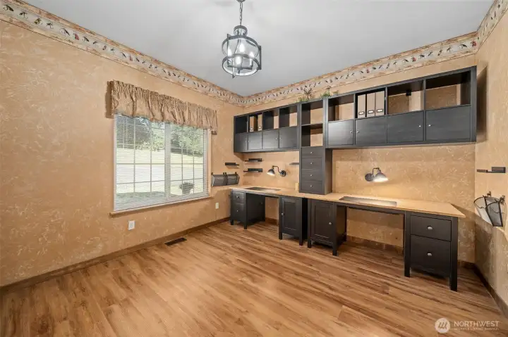Main floor office just off the entry provides an excellent work from home option. Main floor office just off the entry provides an excellent work from home option.
