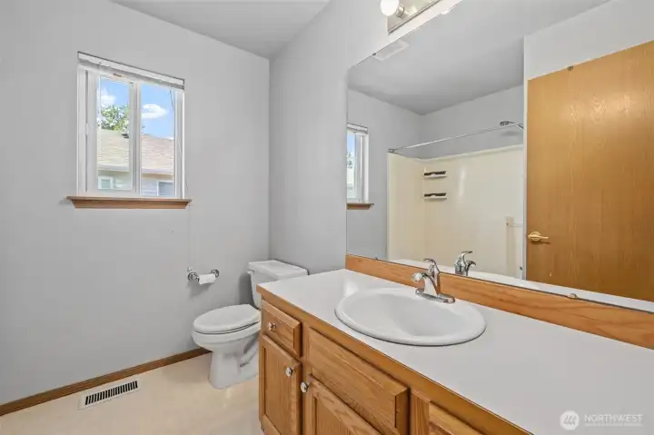 Hall bathroom services the secondary bedroom and guests. Hall bathroom services the secondary bedroom and guests.