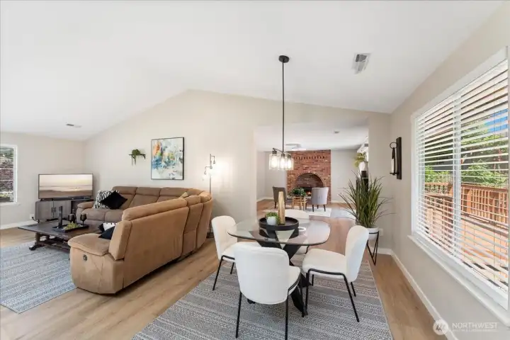 Dining area overlooks the backyard and opens to the deck for effortless indoor-outdoor living. Dining area overlooks the backyard and opens to the deck for effortless indoor-outdoor living.