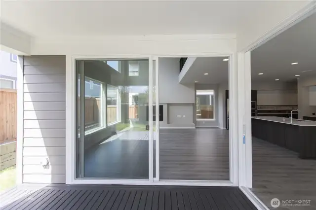 Oversized double sliders join the Great Room with the Outdoor Room.