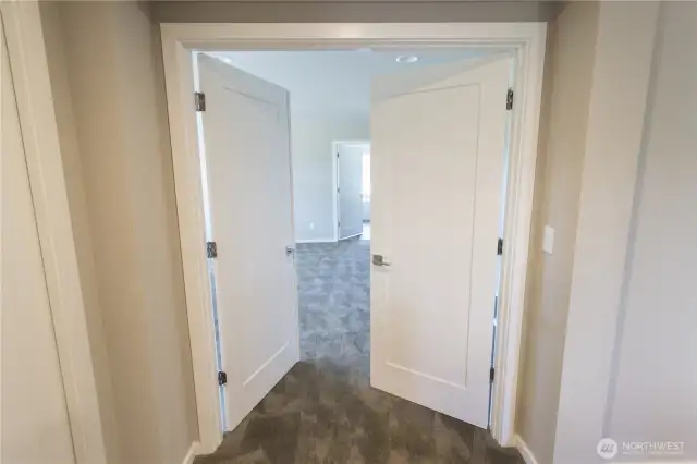Oversized doors opening into Master Suite luxury
