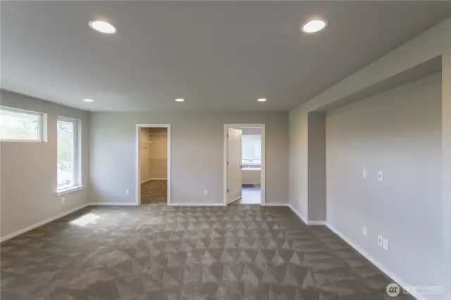 Spacious Master Suite with double walk-in closets & enclosed Master BA