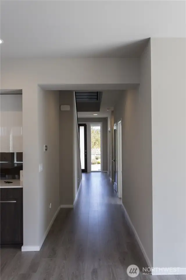 Large foyer leading to the Office/Den, 3/4 BA, Guest Room & Great Room. Timber-look Flooring throughout the Main Floor!
