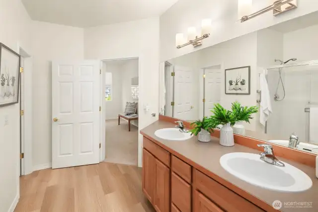 Primary bathroom looking out.  Toilet room door on the left.