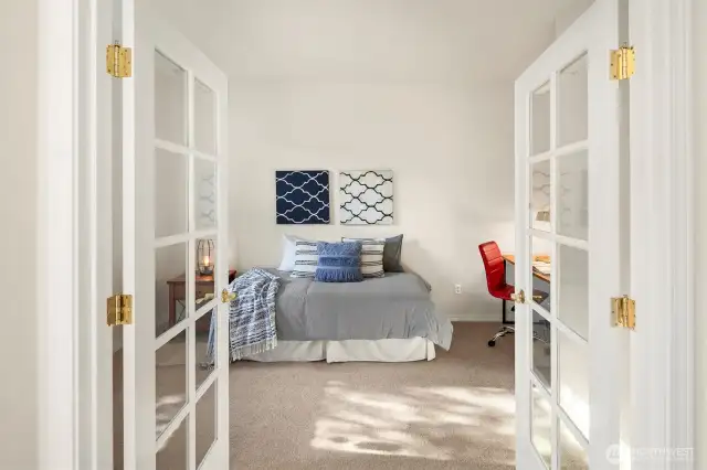 French doors lead you to a den or 2nd bedroom?