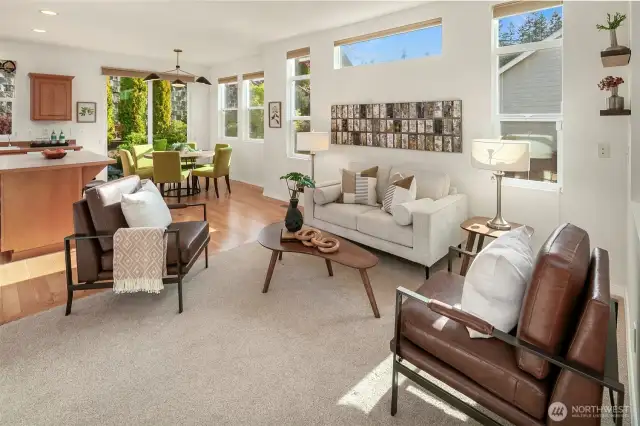 Living Room with a wall of windows.  Window treatments included.