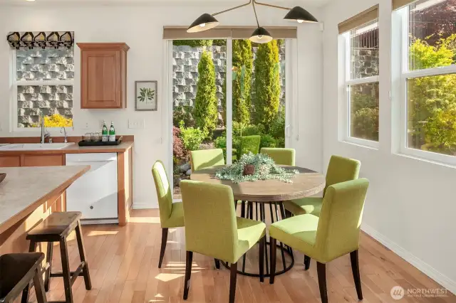 Hardwood floors, updated lighting fixture and the sliding door to backyard.