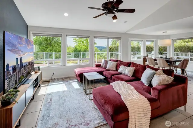 Great room with wall of windows overlooking the Golf Course and beyond