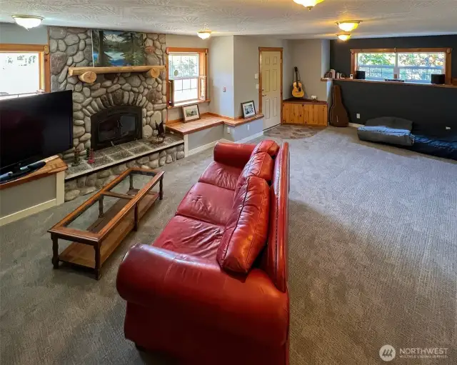 Family Room w/ exterior door and Propane fireplace