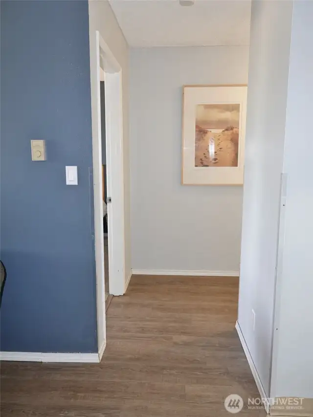 Hallway leading to the Bedroom, and then to the Living/Kitchen Area.