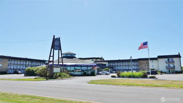 Front view of the Polynesian Hotel Condo building w/ The Rusty Anchor Restaurant.