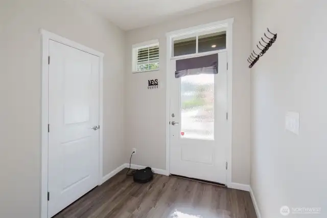 Bright entryway with natural light and modern finishes.
