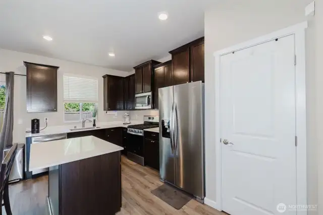 Kitchen with stainless steel appliances and plenty of counter space.