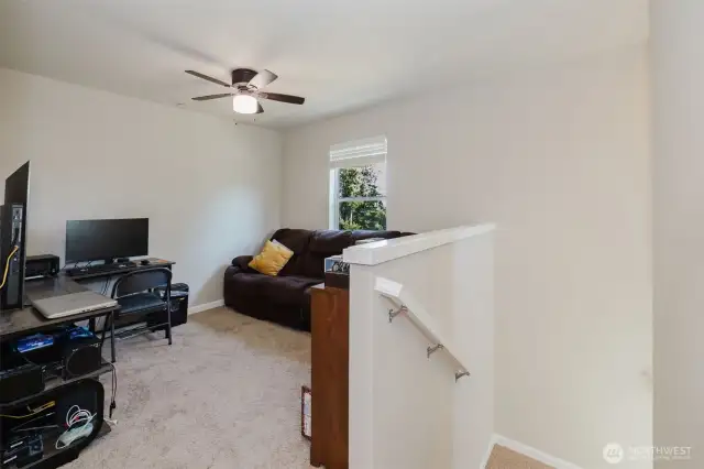 Upstairs loft area for an office, playroom, or lounge.