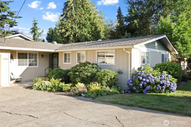Landscaping is lovely and well-mainained.  Recent, high-quality exterior paint and 50 year roof bring peace of mind.