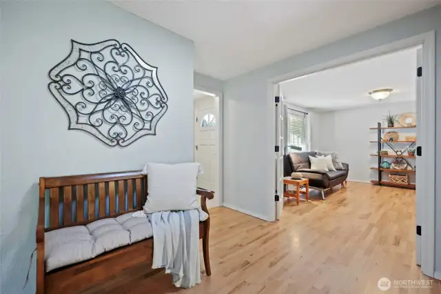 Original hardwood floors have been refinished and re-coated--they are beautiful!  Entry here brings you to the double-French doors leading to the den/office.