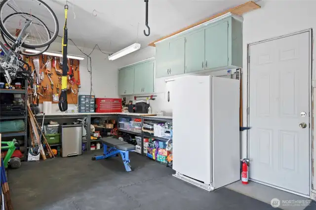 Extra deep garage means room for storage and workshop!  This is the exterior door; mudroom door is just out of the photo to the right.