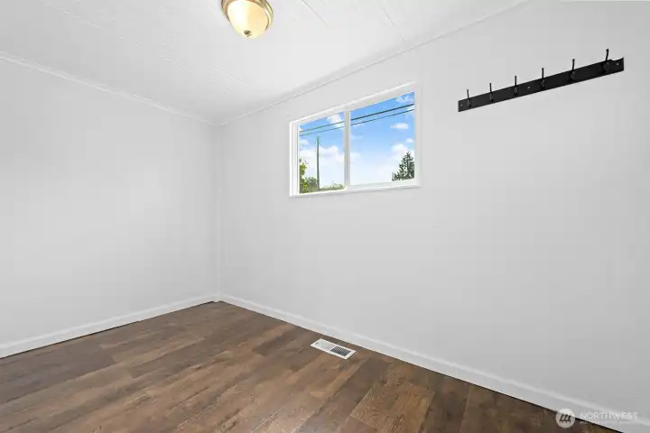 Large and bright entry provides space for home organizing of coats, shoes sports equipment, toys, backpacks....