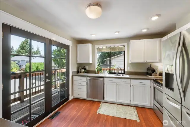 Who doesn't LOVE French Doors? They'll take you out to the wrap-around porch.
