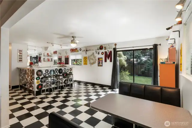 The booth adds to the vibe of the room, and will stay with the home.  You also have access to the back yard through the slider door.