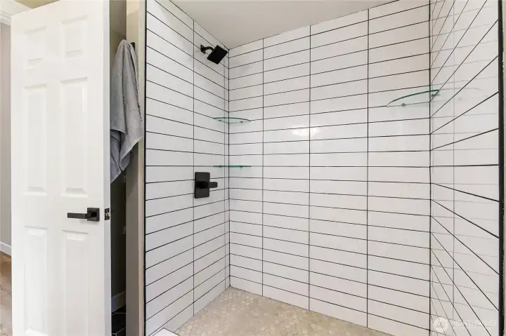Stacked tile in primary shower